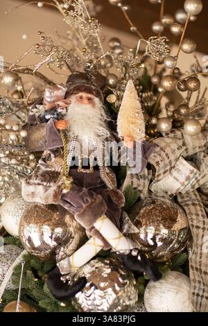 Detail of Santa elf in ornate Christmas tree Stock Photo