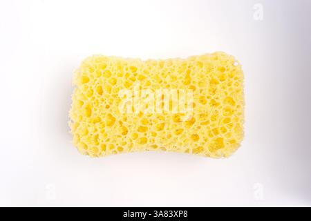 Yellow sponge isolated on the white background with clipping path Stock Photo