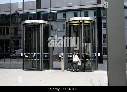 Revolving doors, 103 Colmore Row, Birmingham, UK Stock Photo