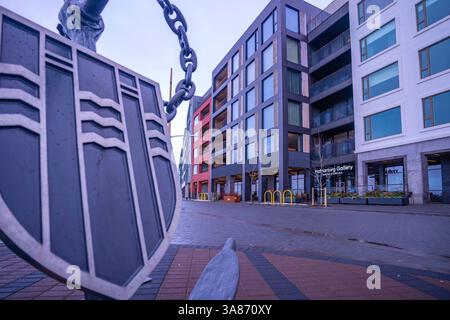 View of waterfront apartments overlooking the Port of Reykjavik in winter, Reykjavik, Iceland Stock Photo