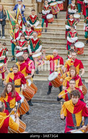 Fool Instrument A marching band wearing costumes parading during a traditional fool's ...