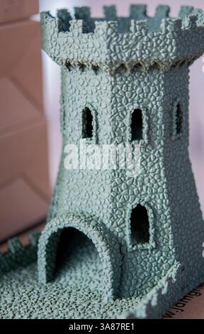 Small object created from molten plastic on 3D printer. Three-dimensional model printed on 3D printer from plastic. Modern new 3d printing technology. FDM technology. Additive progressive technologies Stock Photo