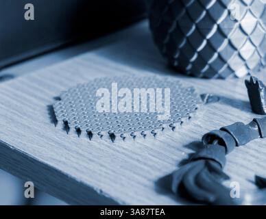 Small object created from molten plastic on 3D printer. Three-dimensional model printed on 3D printer from plastic. Modern new 3d printing technology. FDM technology. Additive progressive technologies Stock Photo
