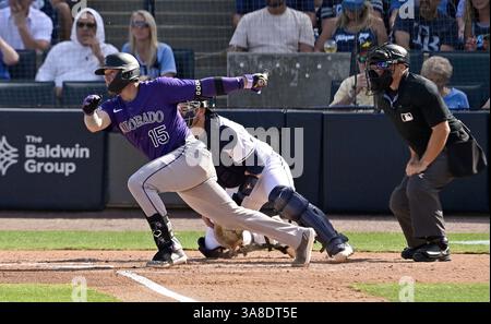 Colorado Rockies' Hunter Goodman singles during the fourth inning of a ...