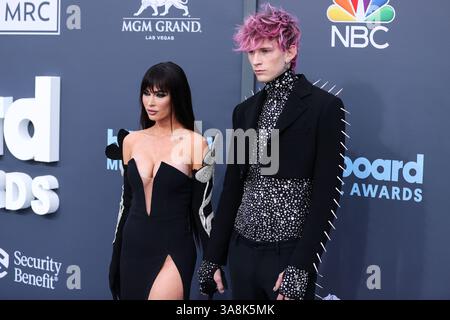 Las Vegas, United States. 28th Mar, 2025. (FILE) Megan Fox and Machine Gun Kelly welcome baby girl on Thursday, March 27, 2025. LAS VEGAS, NEVADA, USA - MAY 15: American actress Megan Fox wearing a David Koma dress and a Loree Rodkin ring and boyfriend/American rapper and singer-songwriter Machine Gun Kelly (Colson Baker) arrive at the 2022 Billboard Music Awards held at the MGM Grand Garden Arena on May 15, 2022 in Las Vegas, Nevada, United States. (Photo by Xavier Collin/Image Press Agency) Credit: Image Press Agency/Ģ����ý Live News Stock Photo