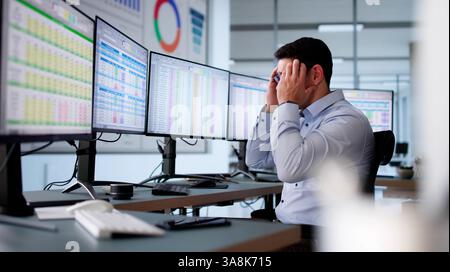 Data Analyst African Man Using Spreadsheet On Computer Stock Photo