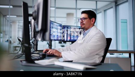 Radiologist Dentist Using X Ray Software On Desktop Computer Stock Photo