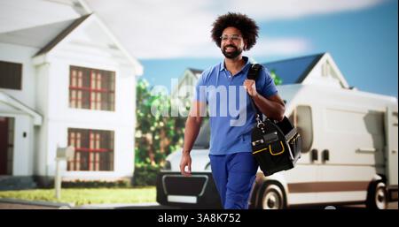 Skilled African American handyman carrying repair box to fix building. Stock Photo