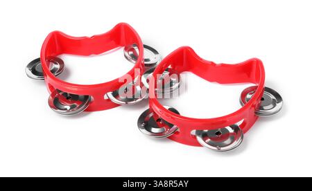 Red toy tambourines isolated on white. Child's musical instrument Stock Photo