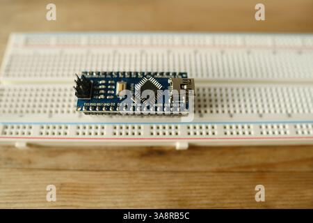 Electronics components, Breadboard in box with jumper wires and breadboard, symbolizing DIY projects, circuit building, electronic prototyping, hobby Stock Photo