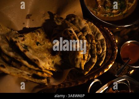 Indian dishes, tortillas in a plate on the table Stock Photo
