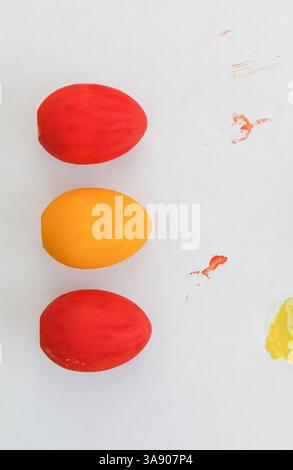 Three freshly painted decorative eggs. Stock Photo