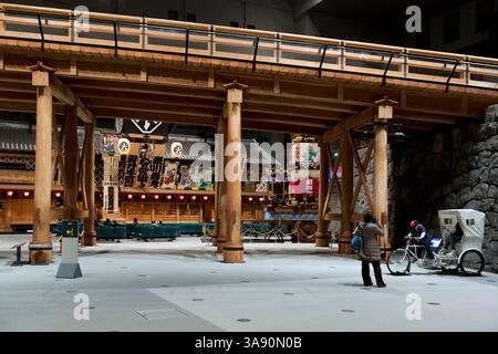 View under a life-size reconstruction of the famous Nipponbashi Bridge, starting point of Tokaido, at the Edo-Tokyo Museum of history in Tokyo, Japan. Stock Photo