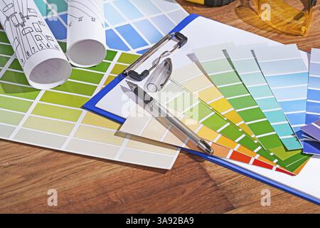 Color palettes on wooden table Stock Photo