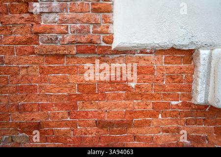 Old red brick background at natural light Stock Photo