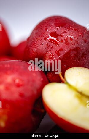 Red Delicious Apples in a group and cut ready to eat. Stock Photo