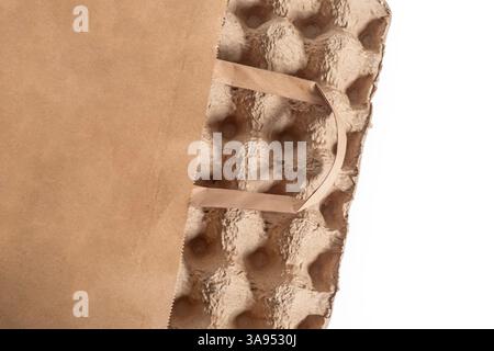 A close-up image showing a paper bag and recycled organic packaging emphasizing sustainability and eco-friendly materials. Stock Photo