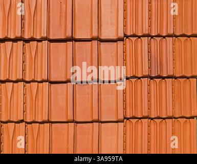 Orange ceramic roof tiles pattern texture background Stock Photo