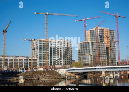 Office building construction site with cranes seen in Berlin, Germany Stock Photo