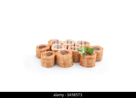 Wafer  rolls with condensed milk isolated on white Stock Photo