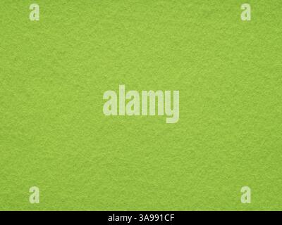 A vibrant burst of lime green, this felt surface is a refreshing ode to the zesty energy of spring Stock Photo