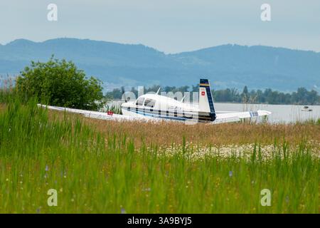 Wangen-Lachen, Switzerland, May 26, 2024 HB-DIA Mooney M20J propeller plane on a small airfield Stock Photo