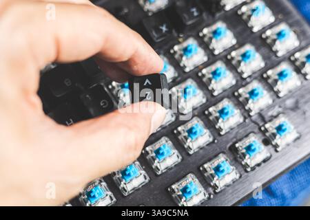 Closeup computer PC keyboard mechanical key under keycaps button for cleaning or change type of key Stock Photo