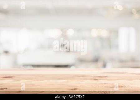 blur interior indoor cafe coffee shop white with wooden table top copy space for advertising montage background template Stock Photo
