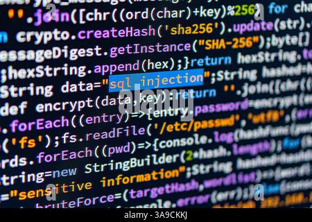 SQL injection. Close-up image of a computer screen displaying highlighted SQL Injection code, emphasizing a cyber security threat The image likely ser Stock Photo