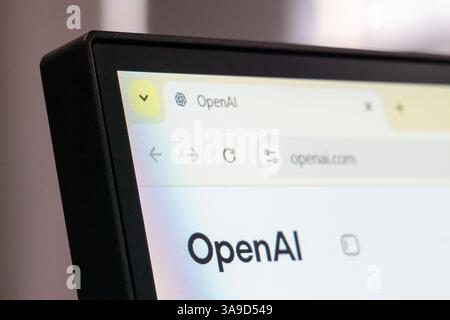 New York, USA - March 30, 2025: OpenAI artificial intelligence company homepage displayed on computer screen with logo and minimal design Stock Photo