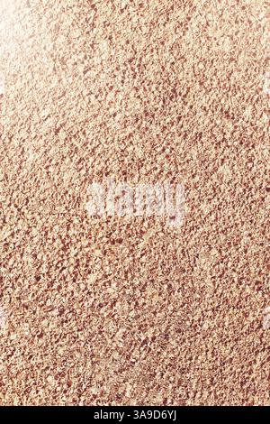 High-resolution golden stucco texture with an artistic glass filter effect. Stock Photo
