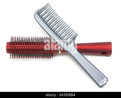 Two combs, red and sulfuric insulated on white background Stock Photo
