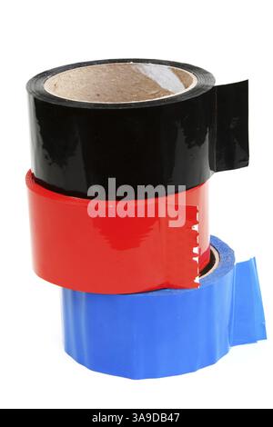 Three rolls of color tape blue, red and black Stock Photo