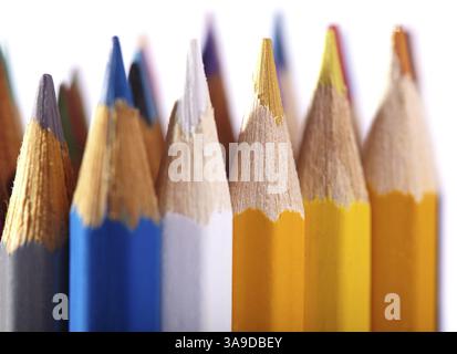 Macro shot of the color pencils isolated on white background. Artist's stuff Stock Photo