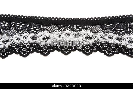 Black lace with pattern in the manner of white flower on white background Stock Photo