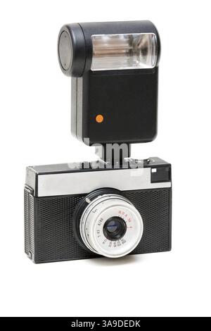 Old camera with a flash Isolated on white background Stock Photo