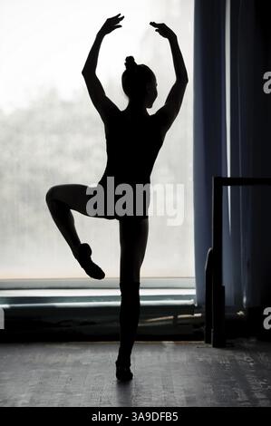 Ballerina silhouette dancing in black and white Stock Photo