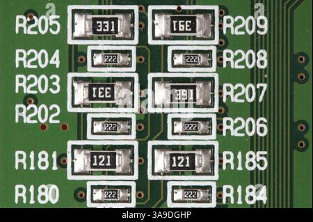 Chips on a green printed electronic board Stock Photo