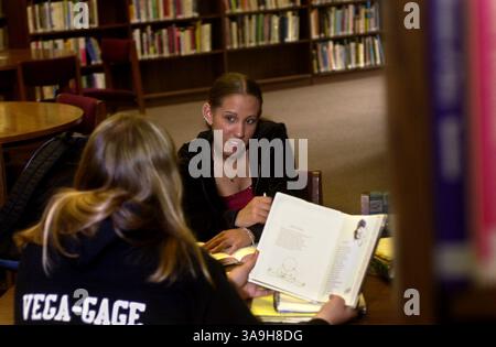 AZ study PL Lede:  Junior High School students  Kim Mills, 14, middle and Domonique Vega, 14 left, study in the Roseville Library April 29 2003. Sacramento Bee/  Andy Alfaro/ZUMA Press Stock Photo