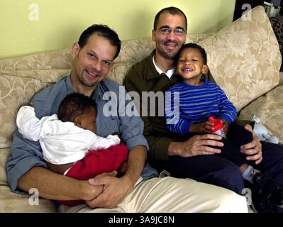 Jun 15, 2001; San Francisco, CA, USA; Writer and Director for the award -winning documentary ''Daddy and Papa'', Johhny Symons, left, with Kenyon Symons-Rogers, and to the right, William Rogers with Zachary Symons-Rogers inside their Oakland home Wednesday afternoon June 12, 2002. The documentary which explores the personal, cultural, and political impact on gay men adopting and raising children. Johhnt Symons and william Rogers live together and are adopting their children. Stock Photo