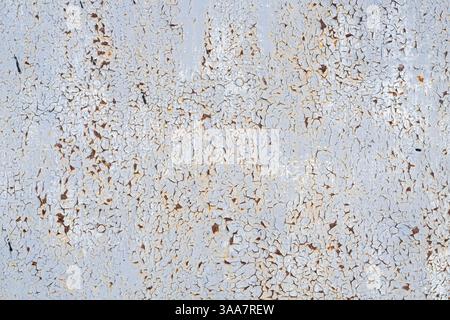 Rusty metal surface with peeling white paint. Texture rusty metal. Abstract background for design Stock Photo