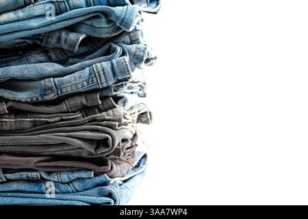 Stack of jeans isolated on white background Stock Photo
