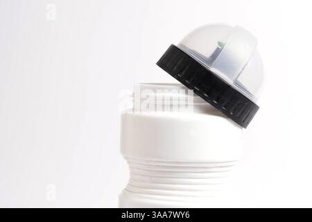 Plastic bottle with an open lid on white background. Isolate Stock Photo