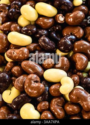 Assorted Chocolate Coated Caramel Cubes Dark, Milk, and White Chocolate Sweet Treat Macro Photography Delicious Dessert Snack for Kids and Adults Party Food Vibrant Confectionery Stock Photo Stock Photo