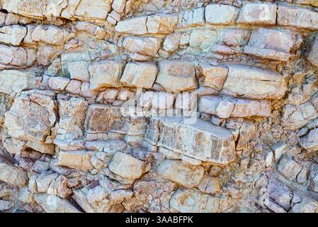 Old stone walI in Karpathos Island, Greece. Background texture. Stock Photo