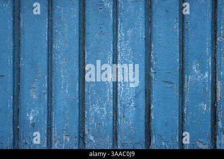 Rustic blue turquoise teal wooden boards with cracked and peeling chipped paint. Perfect for grunge textures, aged material themes for creative backgr Stock Photo
