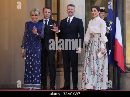 Paris, France. 31st Mar, 2025. French President Emmanuel Macron and his wife, Brigitte (L), greet King Frederik X and Queen Mary of Denmark (R) at the Elysee Palace in Paris, France, on Monday, March 31, 2025. The Danish royals are in the French capital on a three-day state visit. Photo by Maya Vidon-White/UPI Credit: UPI/Alamy Live News Stock Photo