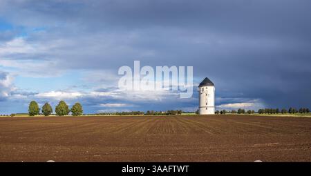 Water tower Croelpa-Loebschuetz, field landscape with ploughed field under a stormy sky with dramatic clouds, near Naumburg, Saxony-Anhalt, Germany, E Stock Photo