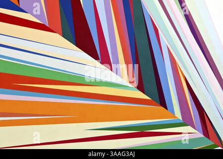 Background of colored bands painted on the wall paint carnival Stock Photo