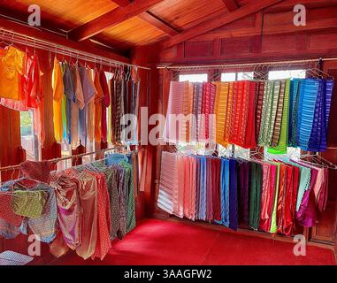 Traditional Thai Silk and Cotton Fabrics in Vibrant Colors A collection of traditional Thai silk and cotton fabrics in a variety of vibrant colors Stock Photo